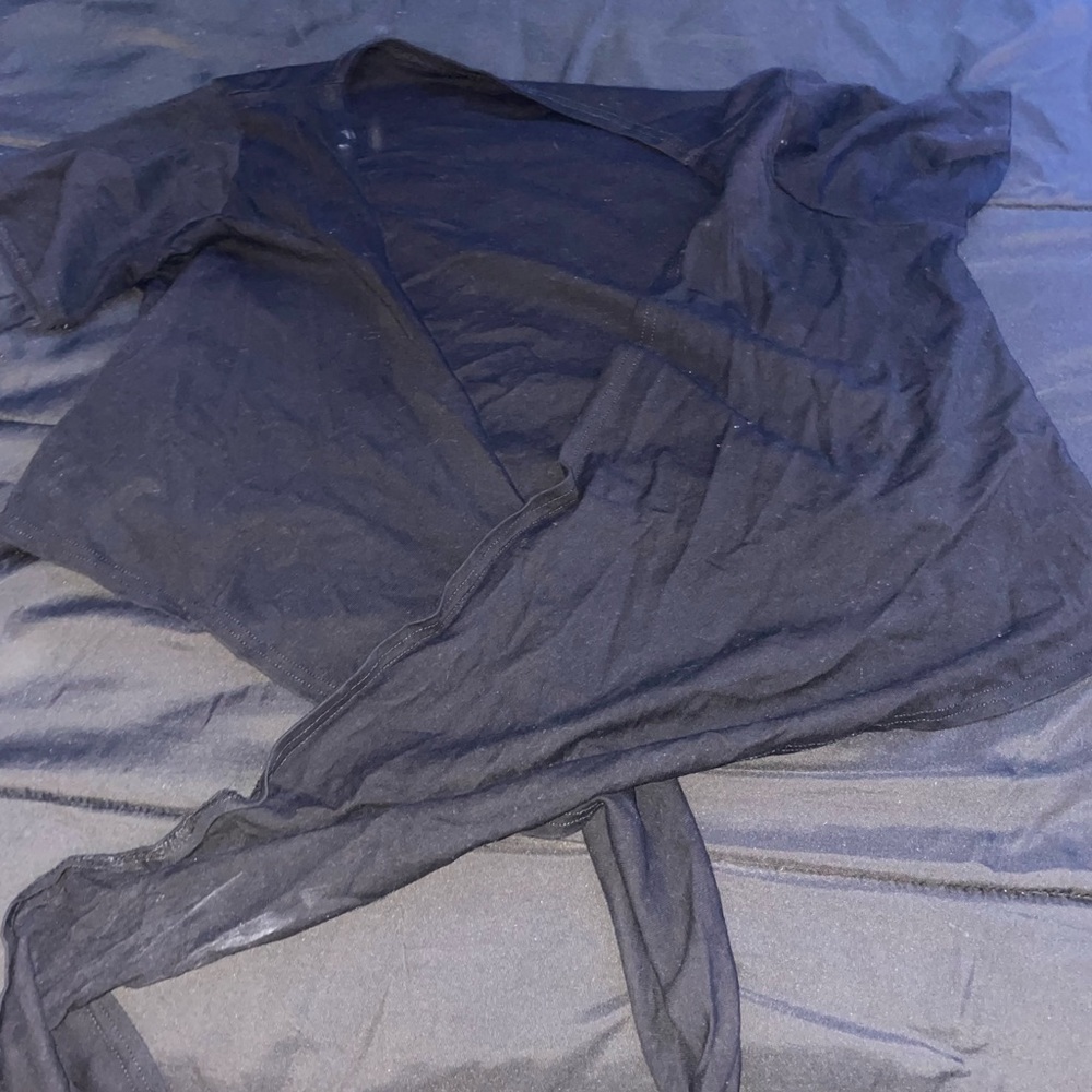 A black wrap shirt.